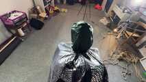 Marie M. taped and gagged in shiny nylon rainwear