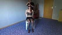 Shelli cuffed and gagged on a chair 1/2