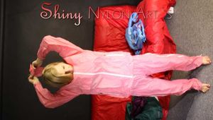 Watching sexy Sandra covering herself with several layers of shiny nylon rainwear including hoods (Pics)