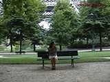 016080 Eve Takes A Pee From A Bench Beneath The Eiffel Tower