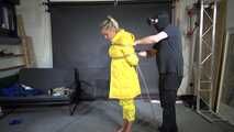 Ms Ungeniert tied, gagged and hooded in shiny nylon yellow Downjacket