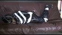 MARA tied, gagged and hoded with tape wearing a supersexy black rain suit (Video)