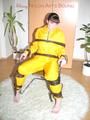 Jill tied, gagged and hooded with a tension belt on a chair wearing a supersexy yellow shiny nylon rainpants and rain jacket (Pics)