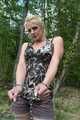 In the forest Hogtied and handcuffed