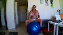  blue bouncy ball ridden off in a bikini
