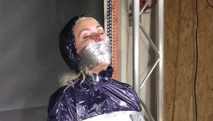 Alice bound, gagged and vibed in shiny nylon Rainwear and she enjoyed it!