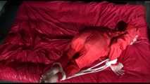 *** HOT HOT HOT*** NEW MODELL*** DESTINY wearing a new sexy red shiny nylon rain suit tied and gagged on bed with ropes and a cloth gag (Video)