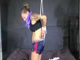 Watch Sandra beeing bound and gagged in her shiny nylon Shorts 