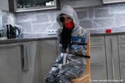 Miss Amira in AGU nylon rain gear and transparent rain suit gets bound and gagged hard