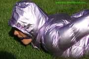 Watch Sandra beeing bound and gagged in her shiny nylon Downwear in the Garden