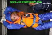 See Ronja tied and gagged by Stella in shiny nylon Rainwear and a Life Vest! Part 2