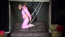 Sexy ***SANDRA*** wearing a hot pink oldschool downbib and a down jacket being tied and gagged with ropes and a clothgag hanging on the ceiling  (Video)