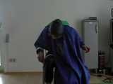 5 short Videos with Katharina tied and gagged in shiny nylon rainwear from 2005-2008