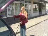 Katharina take a walk with her dog wearing a sexy red shiny down jacket (Video)