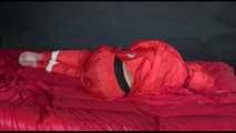 *** HOT HOT HOT*** NEW MODELL*** DESTINY wearing a new sexy red shiny nylon rain suit tied and gagged on bed with ropes and a cloth gag (Video)