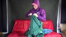 Watching SEXY ***SANDRA*** putting on several rainwear combinations over the other including hoods and closing the last hood (Video)