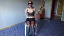 Shelli cuffed and gagged on a chair 2/2