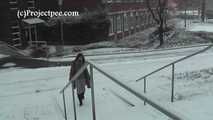 020167 Kathy Pees From A Staircase In The Snow