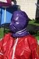 Watch Sandra enjoying beeing bound and gagged in her shiny nylon Rainsuit with a special nylon Hood 