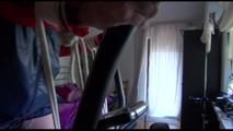 Pia tied and gagged on a crosstrainer for doing her workout well wearing a hot shiny nylon shorts and a rain jacket (Video)