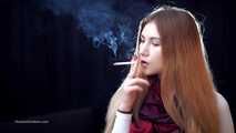 Mysterious girl Valya poses on camera with a tasty 120mm cigarette