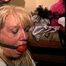 50 Yr OLD REAL ESTATE AGENT IS MOUTH STUFFED, BALL-GAGGED, HANDGAGGED, RING-GAGGED, GAG TALKING, BALL-TIED, BAREFOOT, TOE-TIED, AND LOTS OF TICKLING (D75-9)