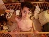 Playing naked in my playpen - with my stuffy sloth ^_^