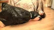 [From archive] Vijaya - captured and hogtaped in her trash bag dress (video)