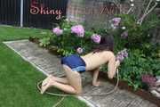 Watching Aiyana wearing only a sexy blue shiny nylon shorts watering the garden (Pics)