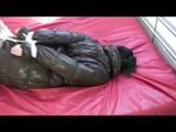 03:10 Min. video with Jill bound and gagged in a shiny nylon down coat