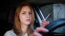 Meet Anastasia in her car while she is smoking two 120mm all white cigarettes