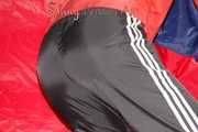 SONJA wearing a very special red shiny nylon jacket and a black shiny nylon pant sorting shiny nylon shorts (Pics)