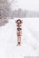 Vika tied up in the snow - Photos