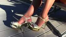 Dangling with sexy golden platforms
