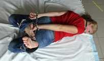 Albina Rose hogtied