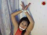 Asian Girl's First Bondage Experience - Tied Legs and Feet and Mouth Gagged...