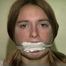 24 Yr OLD CRAFTIER GETS MOUTH STUFFED WITH STINKY SOCK AND TIED IN WITH ROPE, HANDGAGGED, BAREFOOT WITH HANDS, FEET AND TOE-TIED WITH PLASTIC CABLE TIES AND TIED TO A CHAIR WITH ROPE (D73-16)