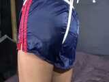 Watch Sandra beeing bound and gagged in her shiny nylon Shorts 