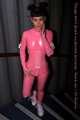 A babypink latex catsuit with Emma and a wet diaper inside