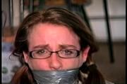 25 Yr OLD NEWS PAPER REPORTER IS WRAP DUCT TAPE GAGGED WEARING EYE GLASSES, TAPE & ROPE BALL TIED, NYLON COVERED FEET ,TOE-TIED, FORCEDD TO SMELL HER SWEATY STINKY SOCKS (D68-14)