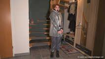 Miss Lara in nylon rain suit and transparent rain gear is bound and gagged