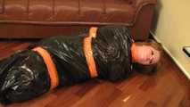 [From archive] Stella - hogtaped in orange duct tape and packed into the trash bag and escapes