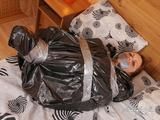 [From archive] Dominica Phoenix - ball taped and packed in trash bag