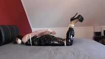 Miss J get hogtied gagged in a shiny PVC outfit