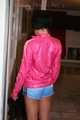 Watching a sexy archive girl wearing a hot lightblue shiny nylon shorts and a pink shiny nylon rainjacket doing her household (Pics)