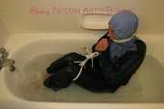 Watching Stella being tied and gagged with ropes and a cloth gag in a bathtub diving under water (Pics)