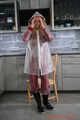 Miss Alice in Nylon rainsuit covered with transparent raingear