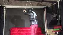 Watching sexy Pia being tied and gagged overhead with ropes and a clothgag wearing a sexy red/black crazy sensation combination (Video)