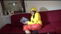 Watching sexy Lucy wearing a orange/yellow shiny nylon downwear combination reaing a magazine and lolling on the sofa (Video)