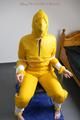 Jill tied and gagged on a chair wearing a yellow rainsuit and coveres with an yellow raincoat with two hoods (Pics)